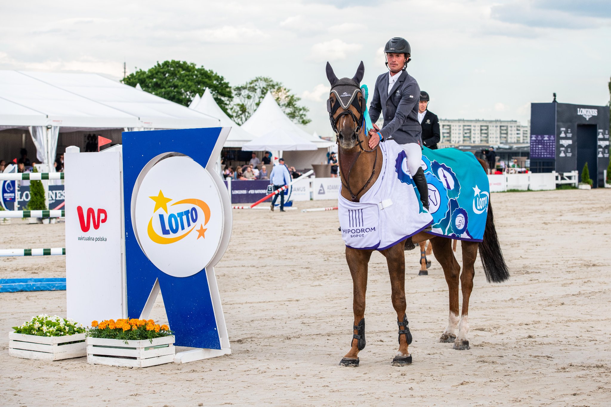 Elian Baumann and Little Lumpi E on top of 1.50m Lotto Price in Sopot