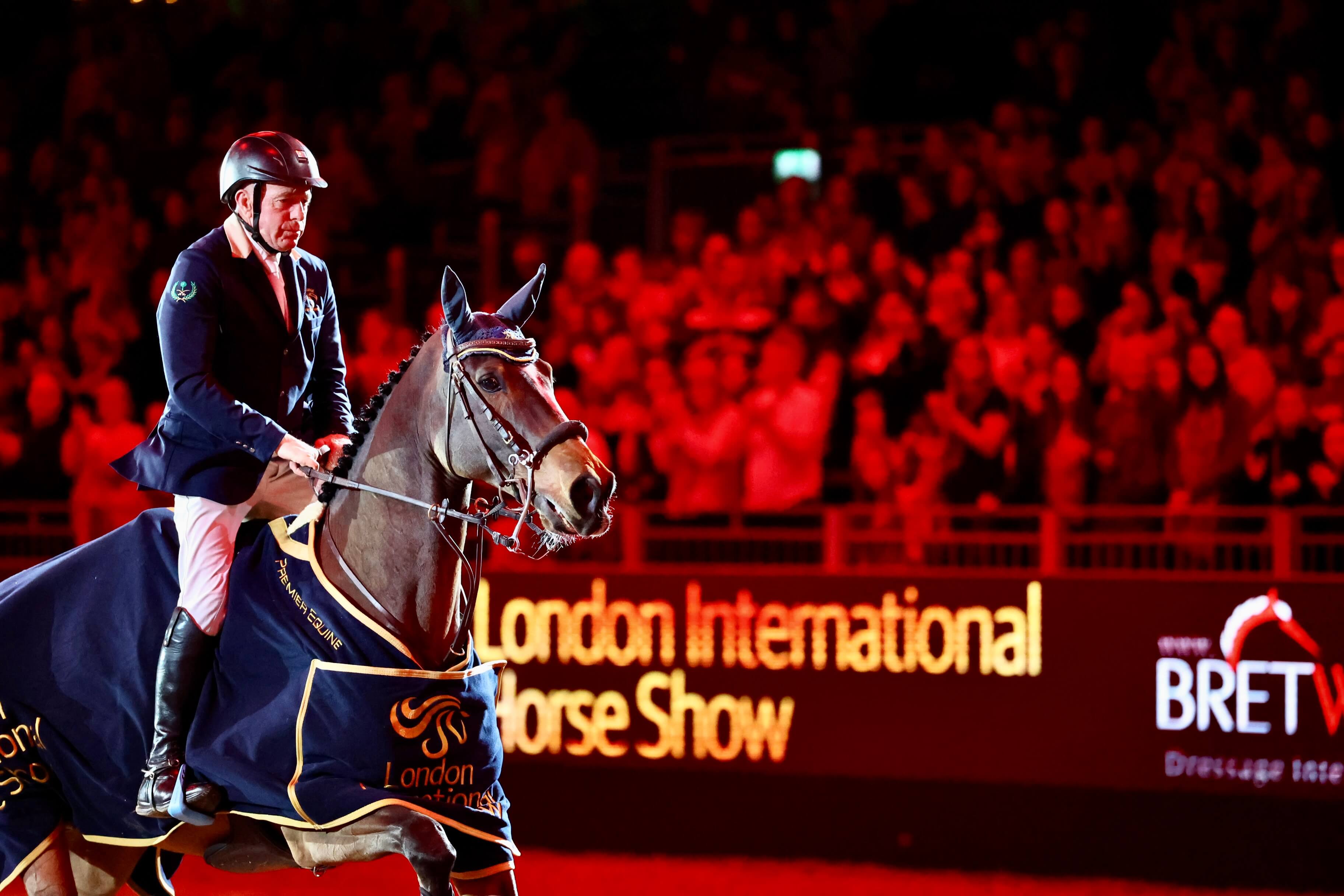 The man, the myth, the legend: John Whitaker and Sharid top the Santa Stakes in London