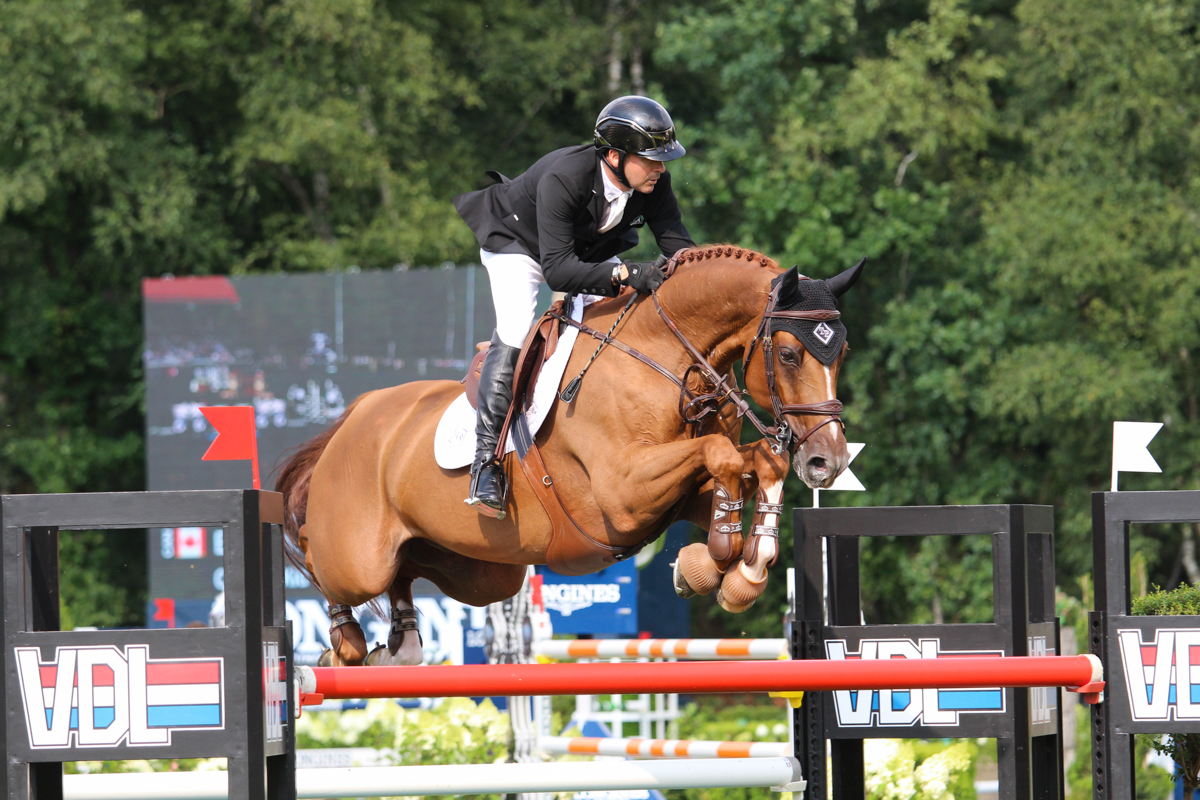 Eric Lamaze rides to victory in Spruce Meadows