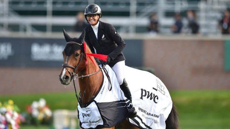 Erynn Ballard rides to the victory in the first Canadian win of the Spruce Meadows 2021 season