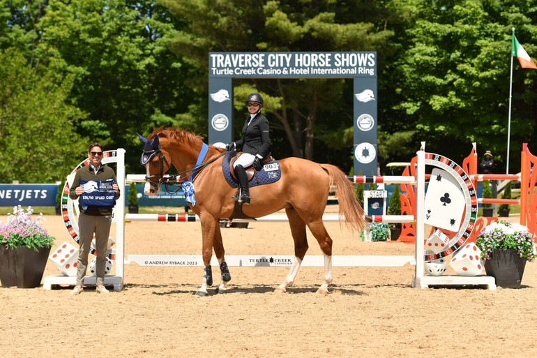 Margie Engle plays her Jackofhearts to kick off Traverse City Spring Horse Shows